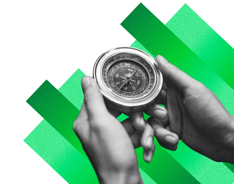 Boussole tenue en main symbolisant le pilotage stratégique d’entreprise